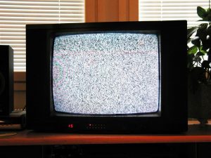 A stock photo image of a tv with static. 